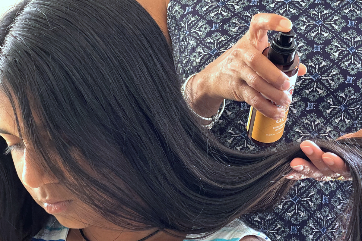 Picutre of girl having hair oiled